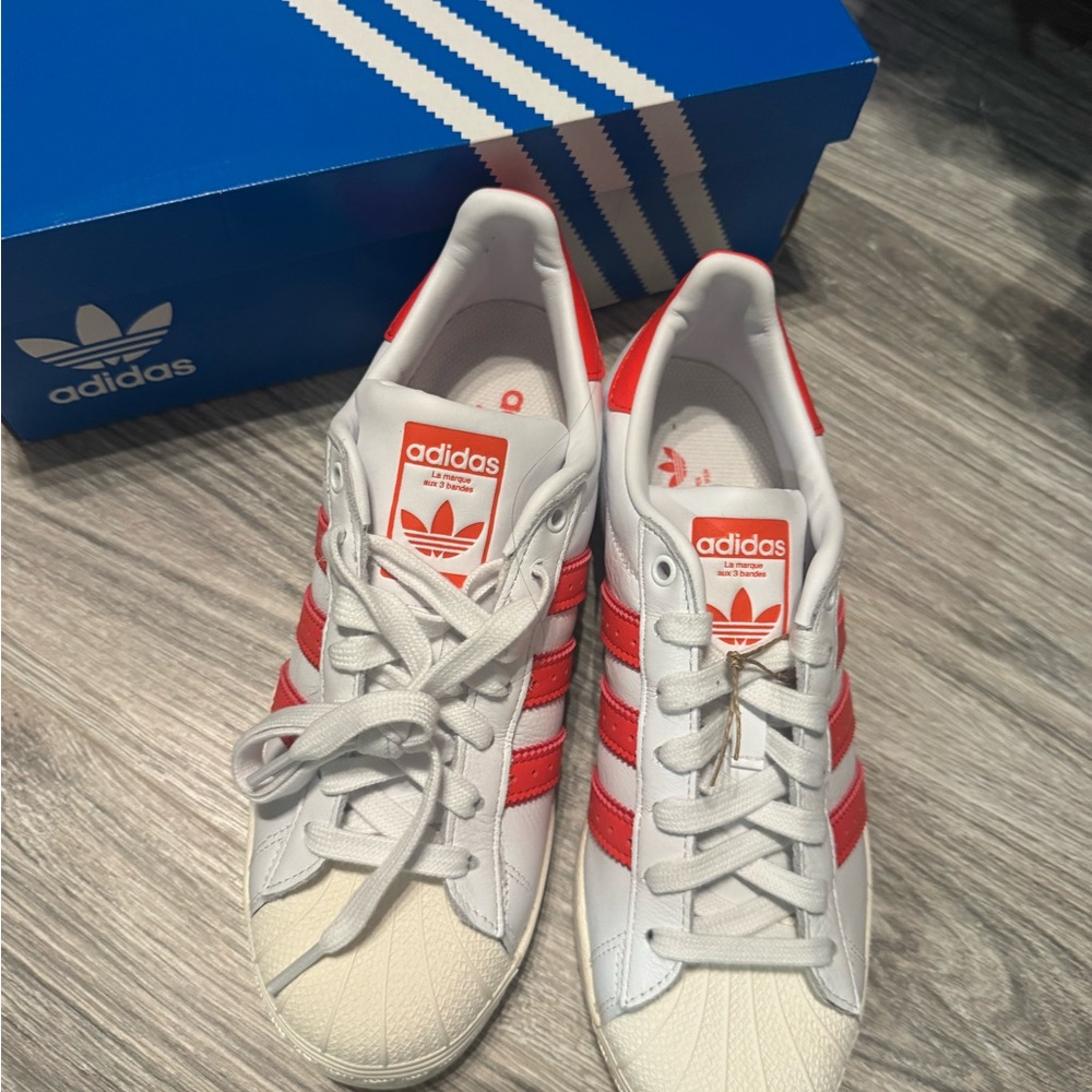 Adidas White and Red Athletic Sneakers with Iconic Stripes